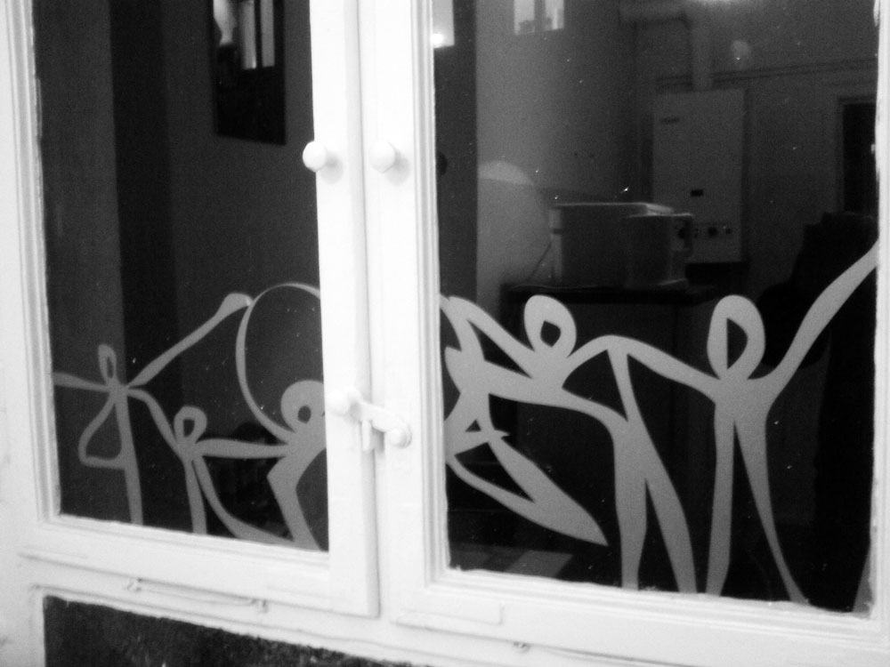 Lyrois: Etched Glass on a European Window
